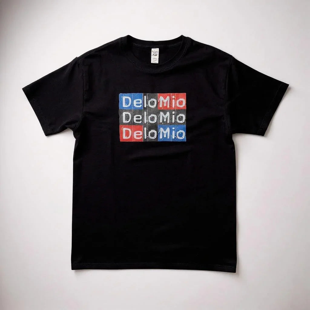 De Lo Mio Center Unisex T-Shirt front view | Bold center print t-shirt | Cultural pride unisex tee | De Lo Mio graphic shirt for men and women | Soft cotton unisex streetwear tee | De Lo Mio shirt folded flat lay | Comfortable everyday t-shirt | Latin culture inspired unisex top | Minimal bold design t-shirt | De Lo Mio centered text close-up | Unisex fit cultural statement tee | Trendy casual outfit graphic shirt