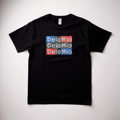 De Lo Mio Center Unisex T-Shirt front view | Bold center print t-shirt | Cultural pride unisex tee | De Lo Mio graphic shirt for men and women | Soft cotton unisex streetwear tee | De Lo Mio shirt folded flat lay | Comfortable everyday t-shirt | Latin culture inspired unisex top | Minimal bold design t-shirt | De Lo Mio centered text close-up | Unisex fit cultural statement tee | Trendy casual outfit graphic shirt